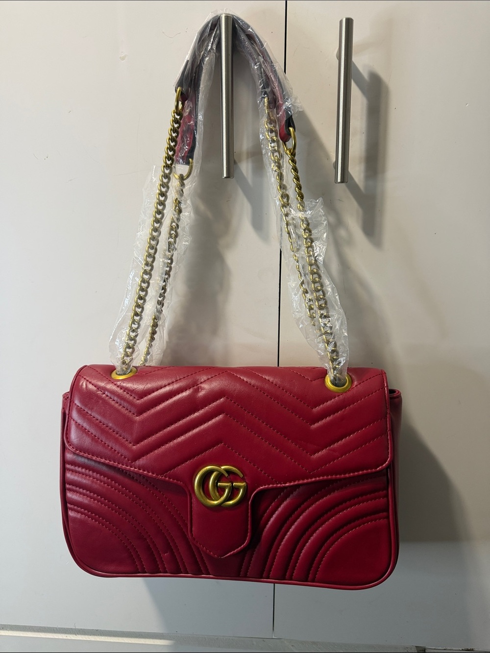 Not Rated Red Quilted Shoulder Bag with Gold Chain and Logo Accent